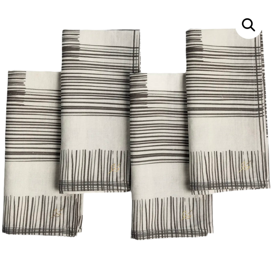 Set of four Hard Rock napkins by The Vault Creative featuring bold rock-themed designs and vibrant colors.