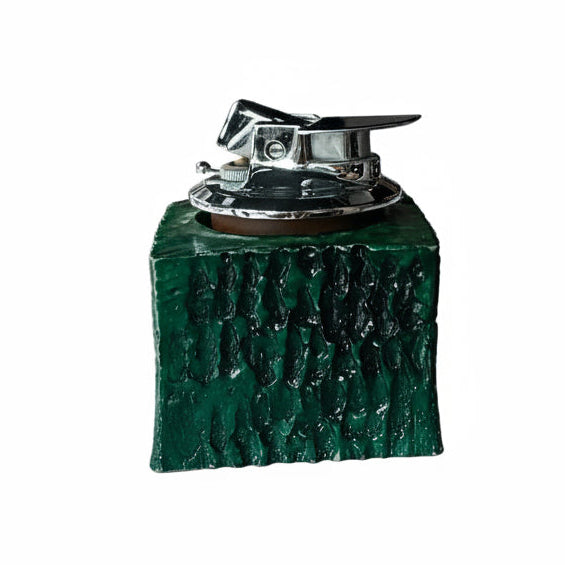 Vintage Ronson lighter with metal body and classic design, featuring the Vault Creative branding and retro styling.