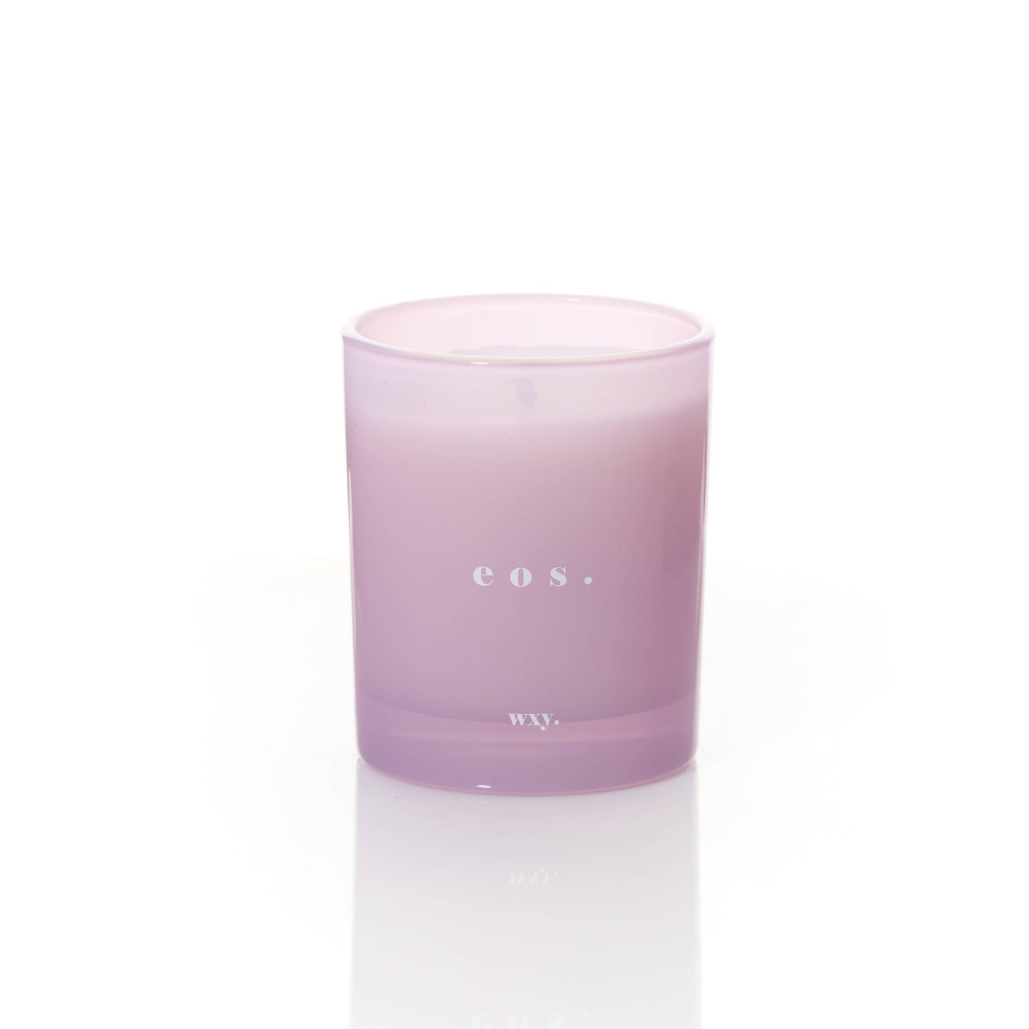 WXY eos 7oz candle featuring Orris Root and Amber scent, shown with the candle in a glass jar and a lit wick.