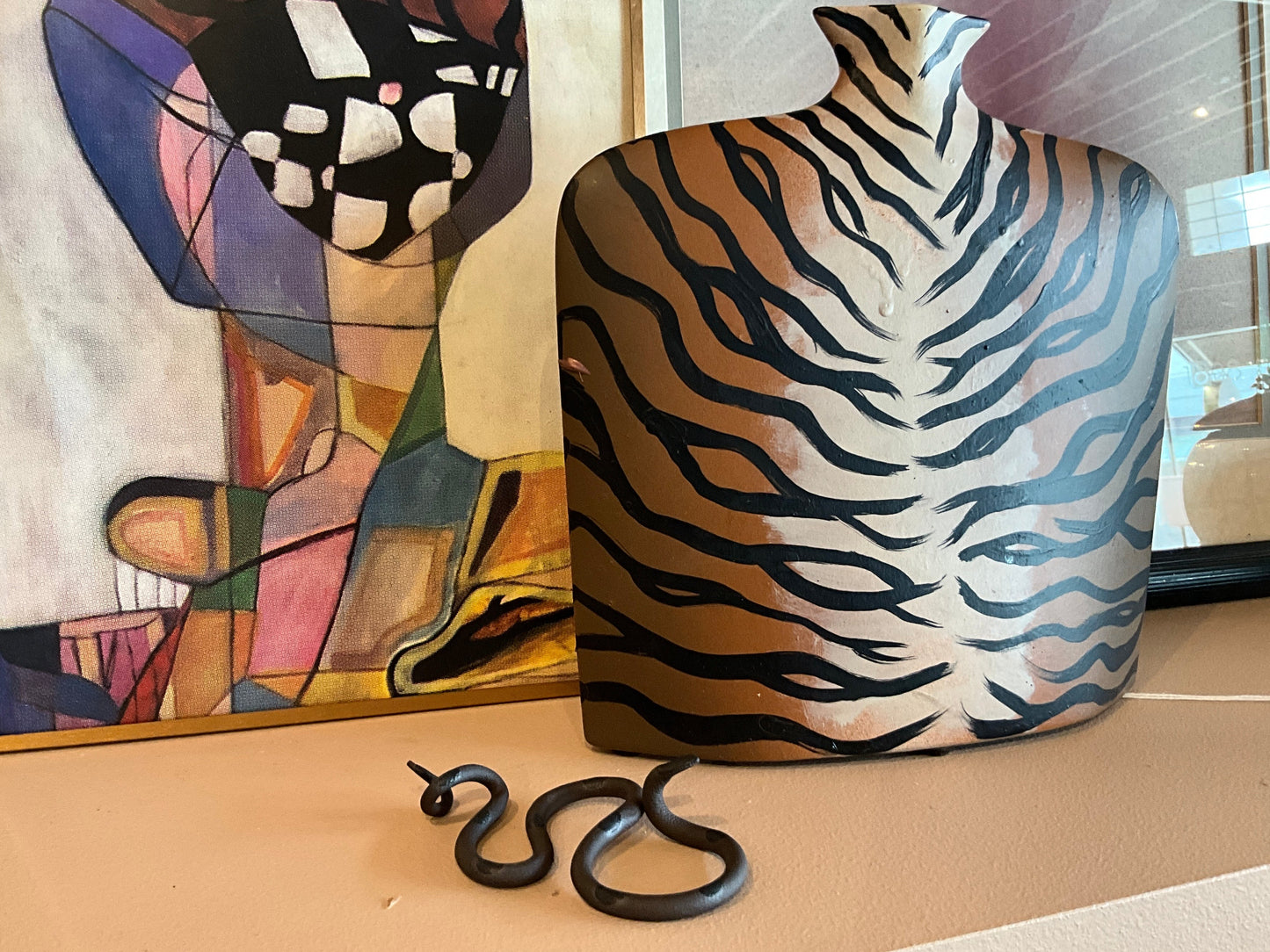 The Vault Creative Saul snake sculpture with detailed, textured surface and vibrant colors on a neutral background.
