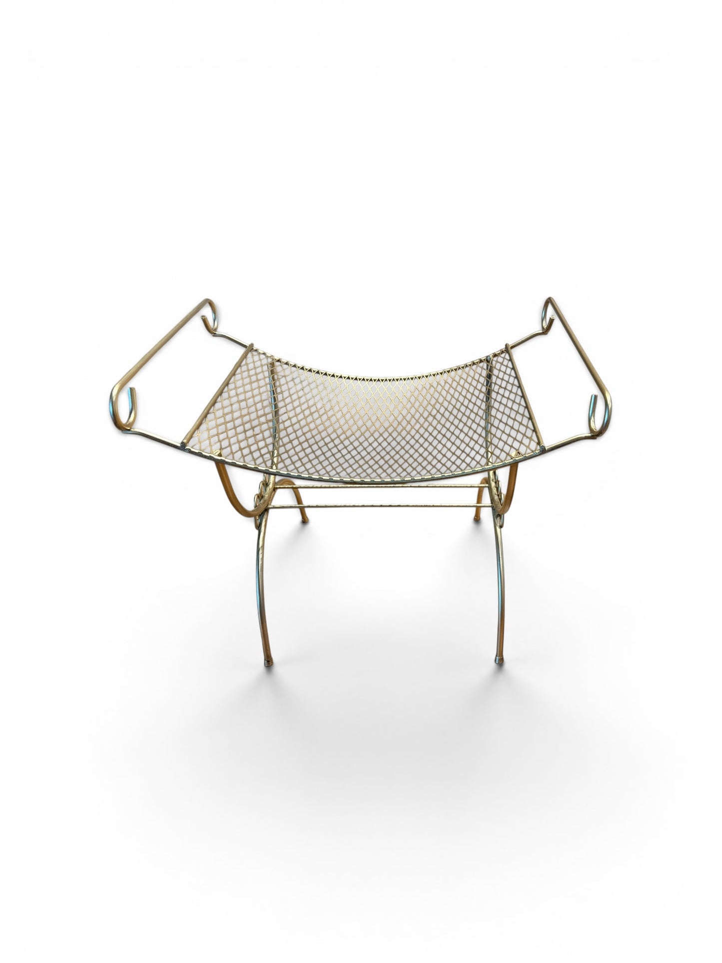 Vintage gold vanity bench with plush cushioning and ornate legs, perfect for elegant dressing areas.
