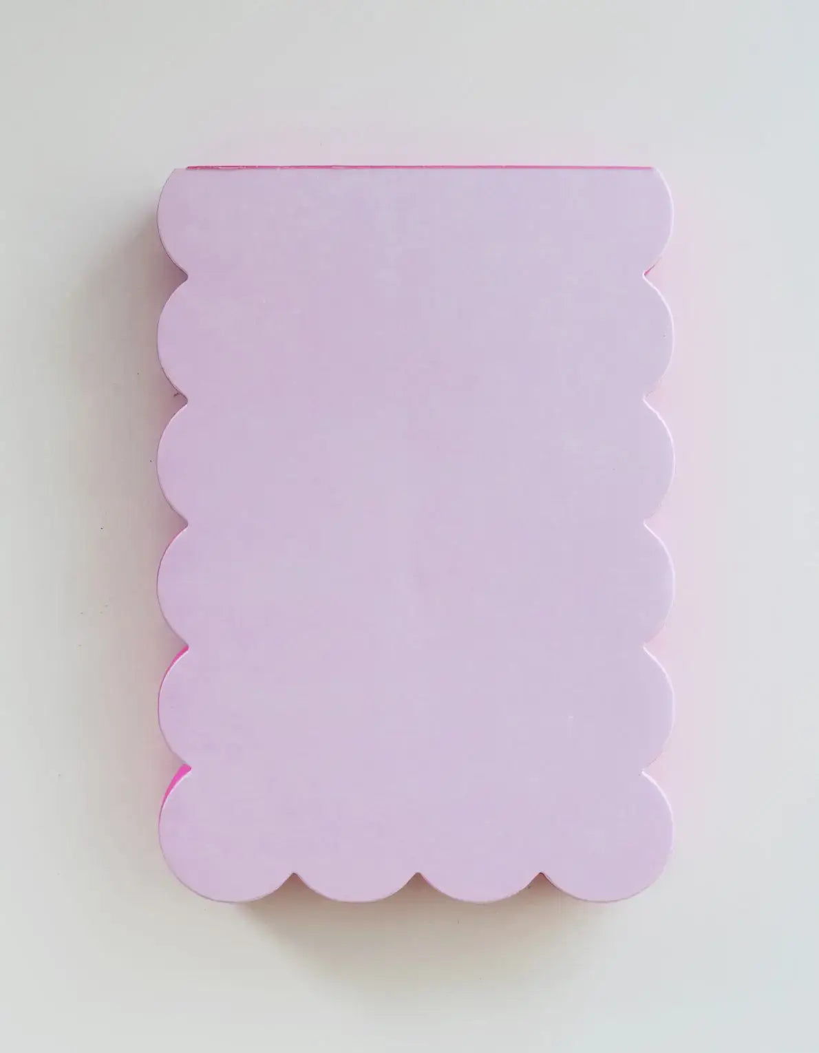Lilac and hot pink edged scalloped shaped notepad by Idlewild Co. with decorative scalloped edges on white background