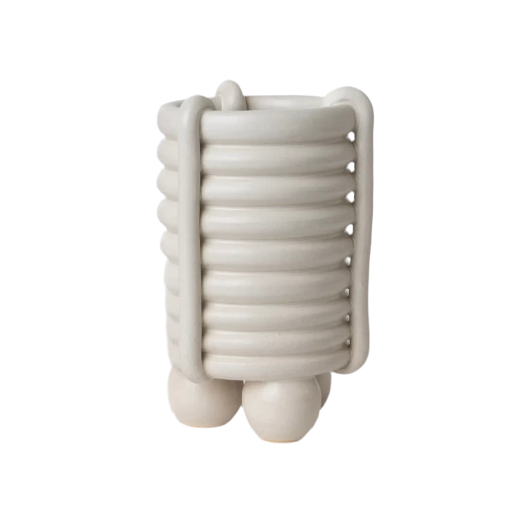 The Vault Creative High Roller Vase, tall ceramic vase with a glossy finish, showcasing a modern, sleek design.