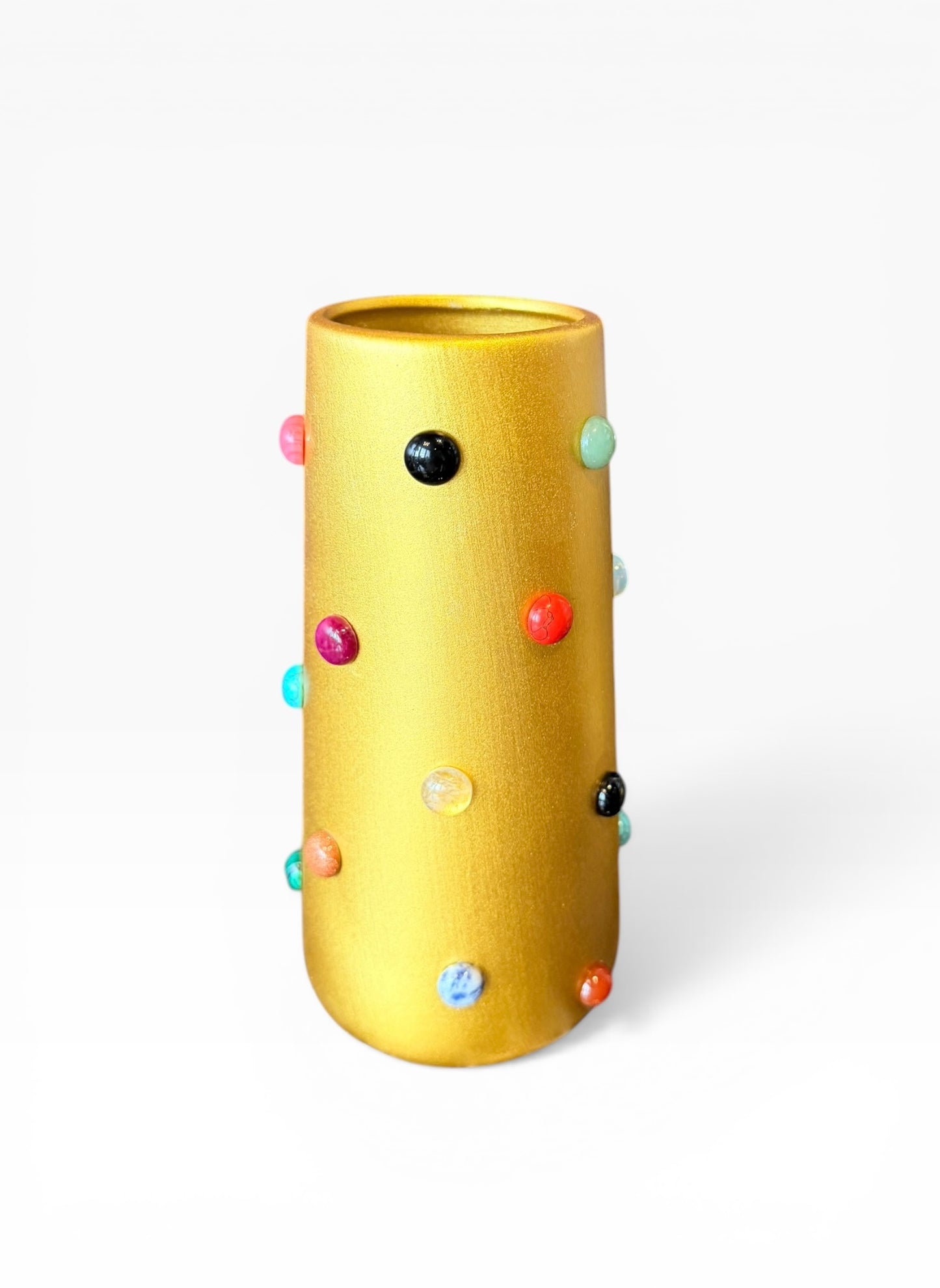 Gold vase from P.Grunsfeld by The Vault Creative, featuring a sleek, modern design with a shiny finish and elegant shape.
