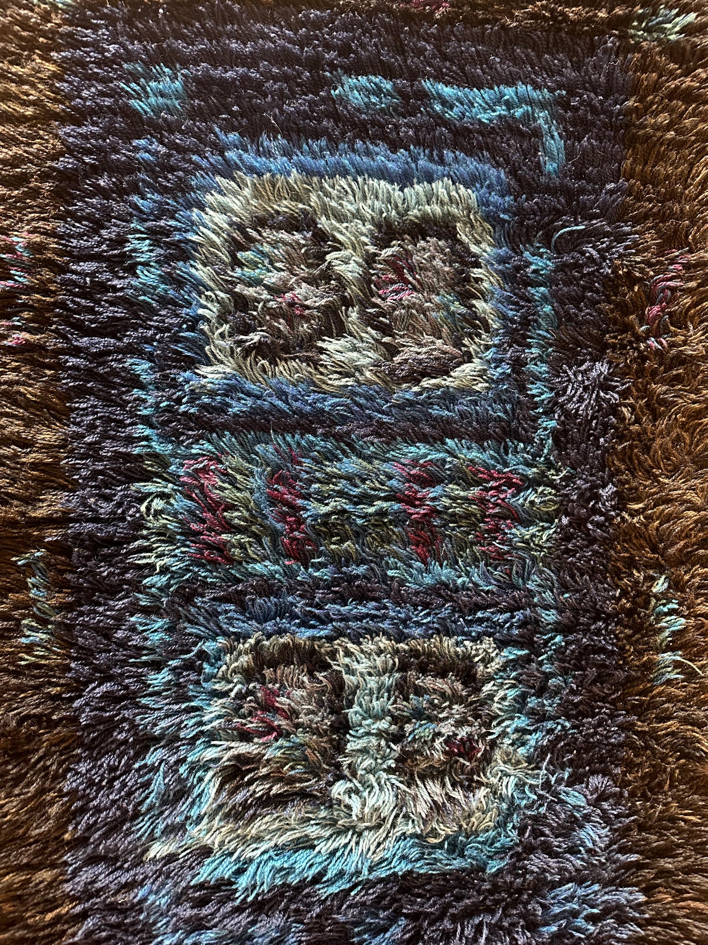 Mid-century shag rug by Ozmun Home with plush, textured fibers in a stylish design, ideal for modern living spaces.