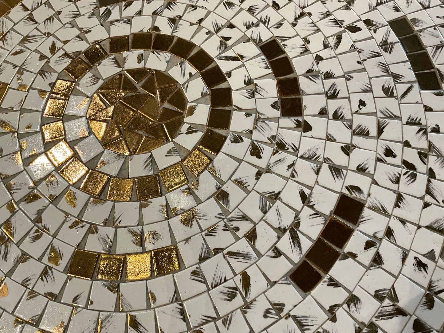 Glam gold tiled coffee table by The Vault Creative with a sleek modern design and shiny gold surface.