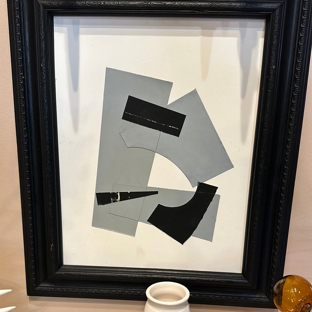 Black and white collage artwork in a framed design by Stone Textile Studio, featuring abstract and geometric patterns.