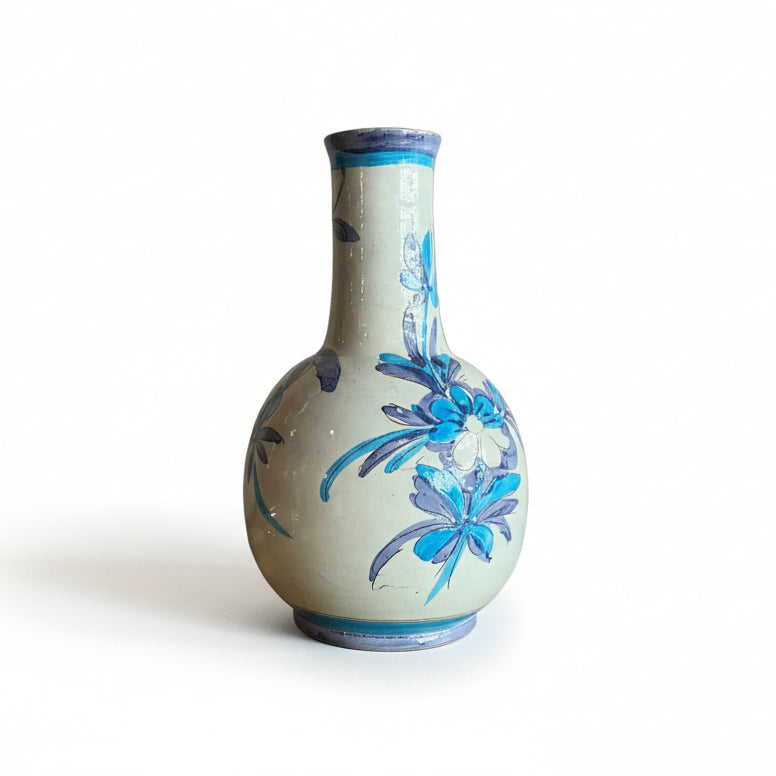Vintage Italian flower vase by The Vault Creative with intricate floral patterns and classic ceramic design.