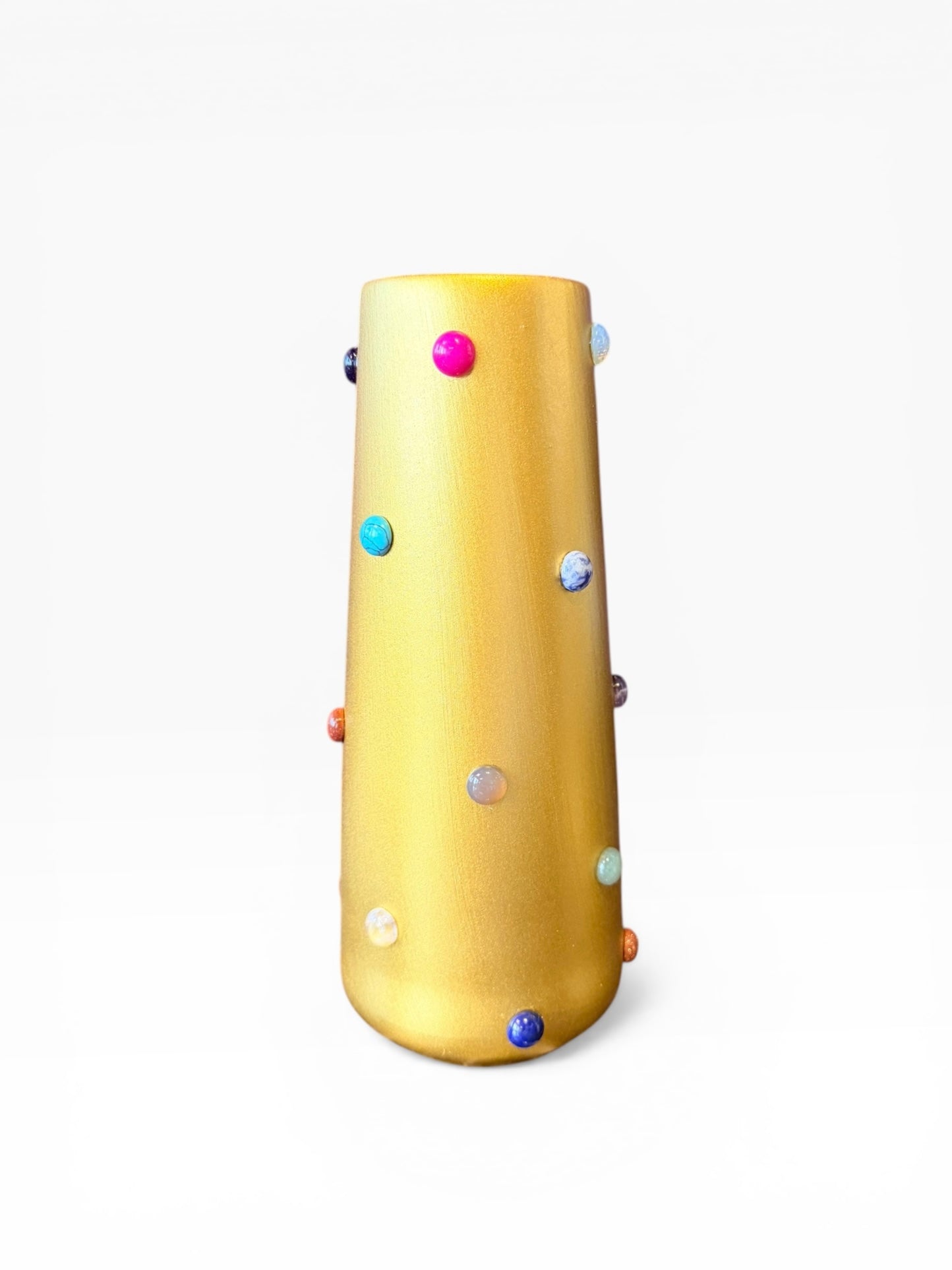 Gold vase from P.Grunsfeld by The Vault Creative, with a sleek, shiny finish and elegant floral design.
