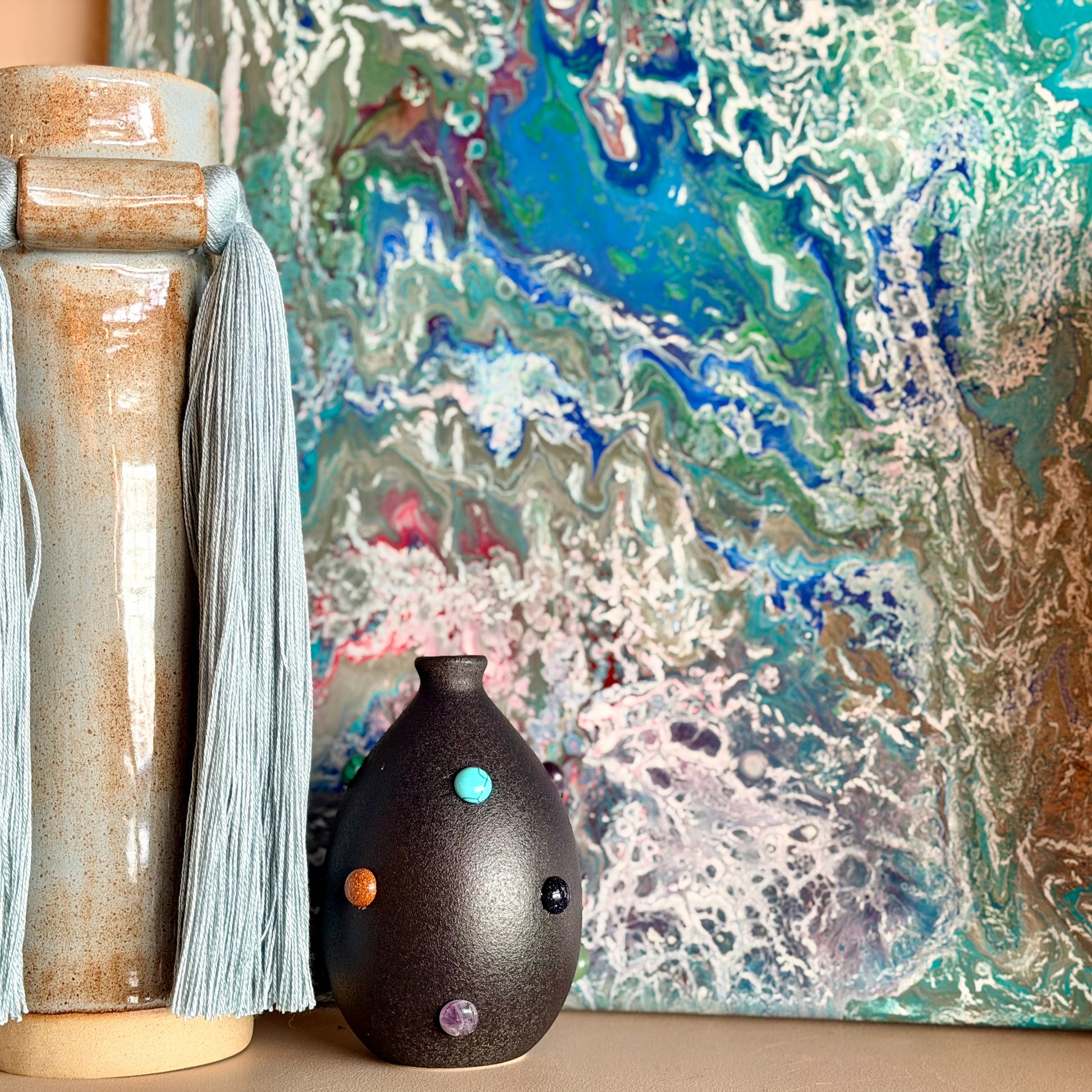 P. Grunsfeld Katie Bud Vase by The Vault Creative, featuring a unique ceramic design with a narrow opening and textured surface.