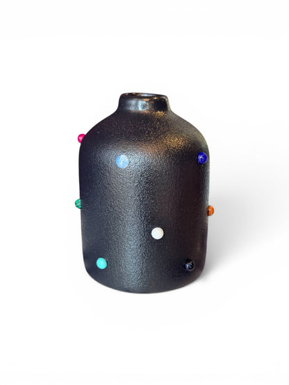 Phoebe P. Grunsfeld June Bud Vase, ceramic flower holder with a glossy finish and intricate design.