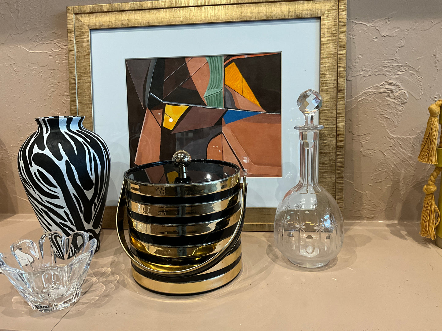 Vintage ice bucket by The Vault Creative, featuring a classic design with metal handles and a polished finish.