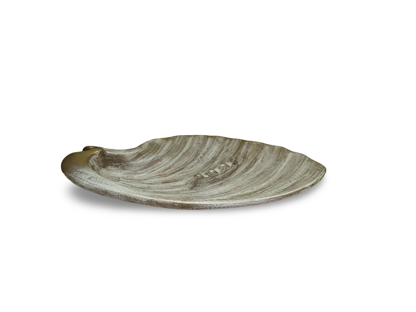 The Vault Creative Haegar Shell Ashtray, a tabletop ceramic ashtray with a shell design, shown on a flat surface.