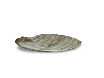 The Vault Creative Haegar Shell Ashtray, a tabletop ceramic ashtray with a shell design, shown on a flat surface.
