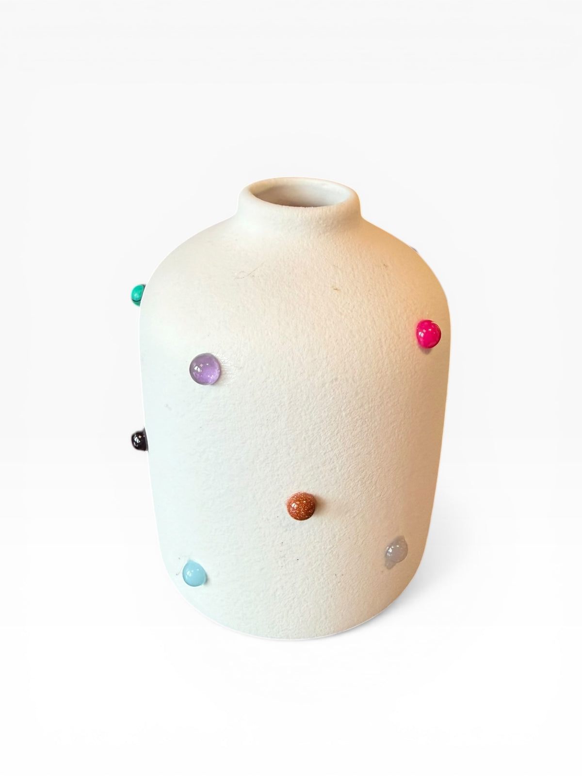Phoebe P. Grunsfeld June Bud Vase featuring a delicate ceramic design with floral patterns on a neutral background