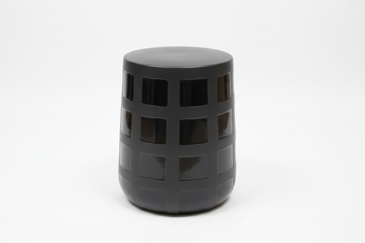 Ceramic patchwork stool by The Vault Creative featuring a colorful, artistic design and sturdy wooden legs.