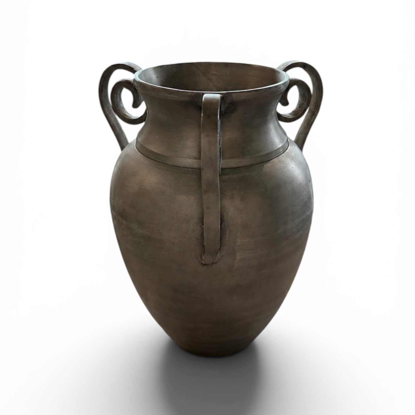 Cast metal urn vase by Ozmun Home, featuring a sleek, modern design with a smooth finish and decorative base.