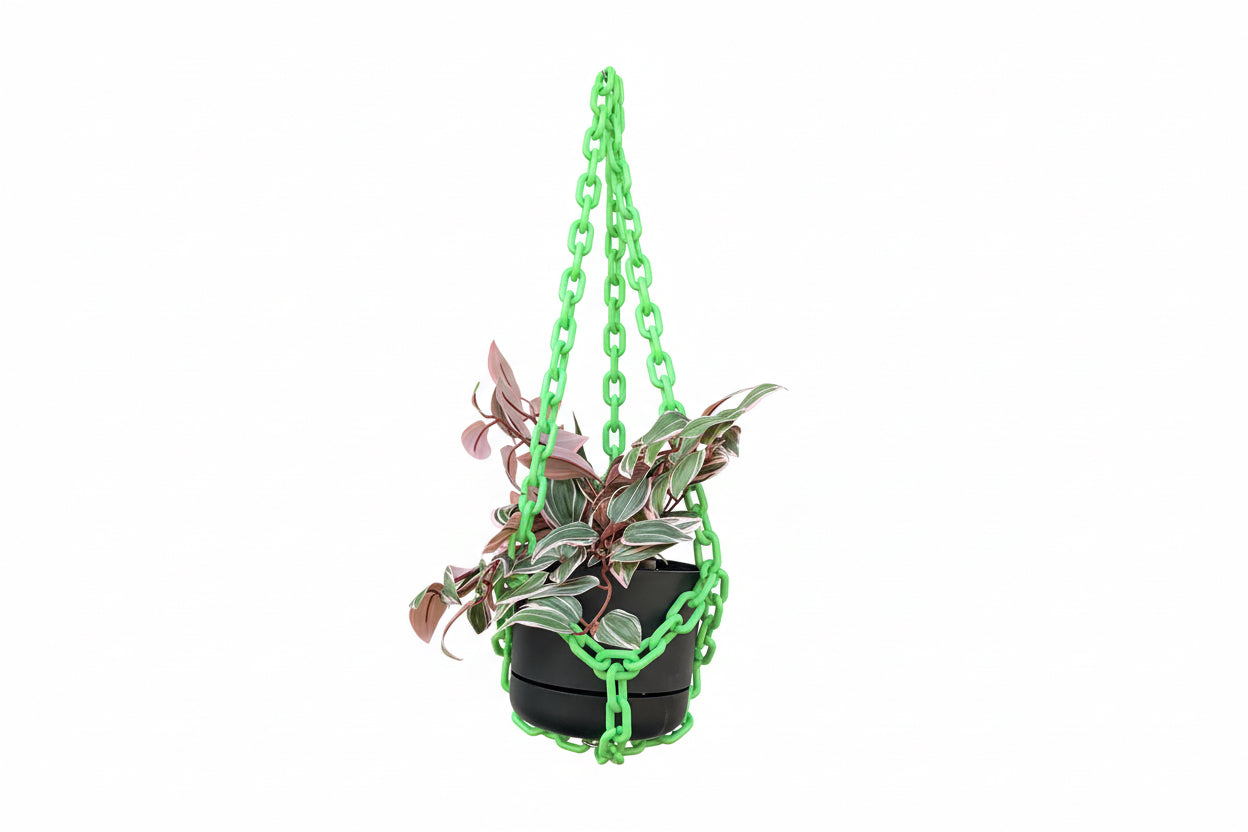 Mint Chain Hanging Planter from The Vault Creative with a mint green ceramic pot and metal chain for wall or ceiling decor.