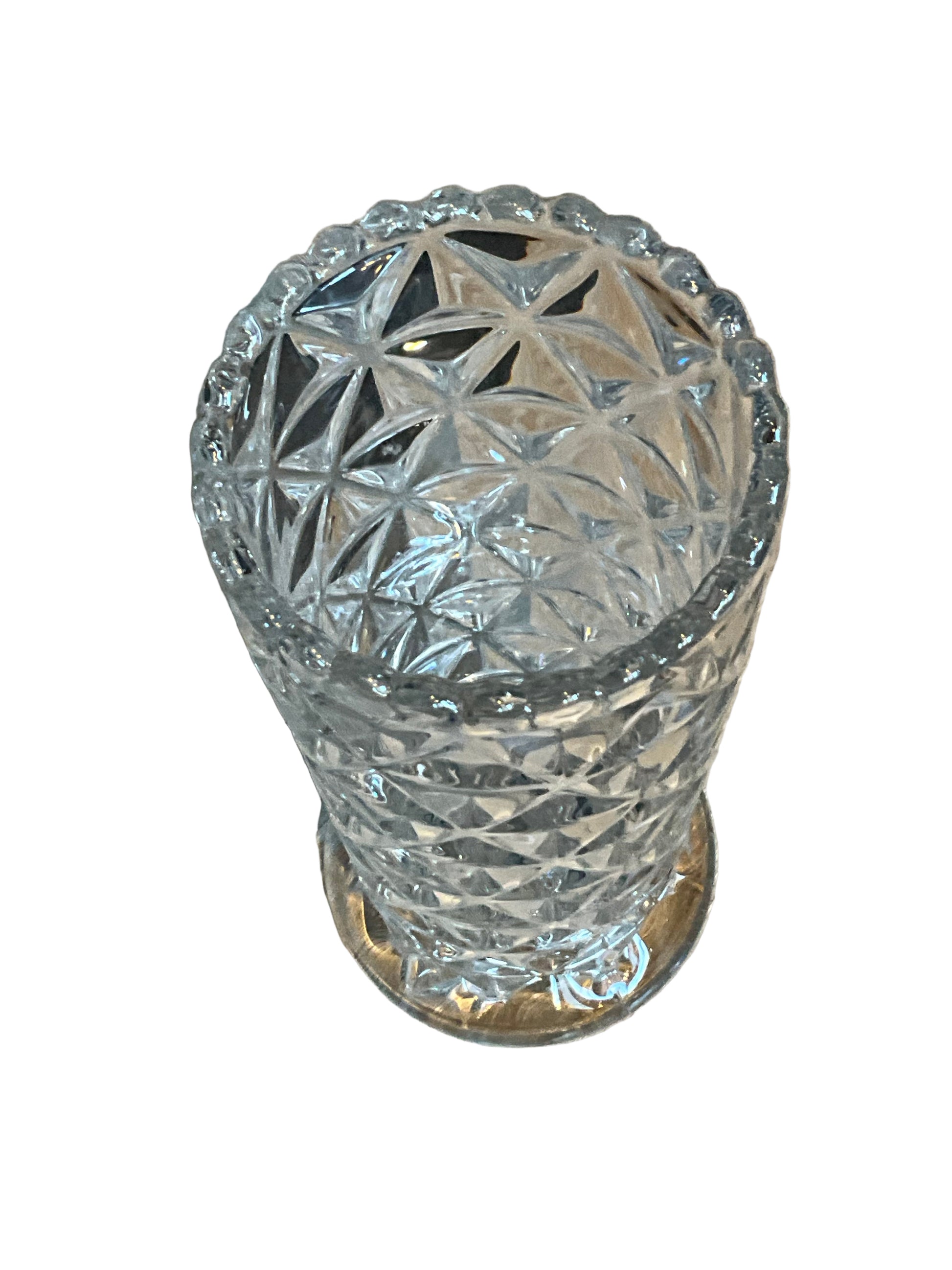 Mid Century glass scalloped vase by The Vault Creative with a smooth, rounded design and scalloped rim for decorative display.