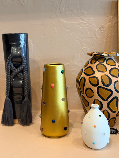 The Vault Creative P. Grunsfeld Katie bud vase featuring a sleek, modern design with a narrow neck and smooth ceramic finish.