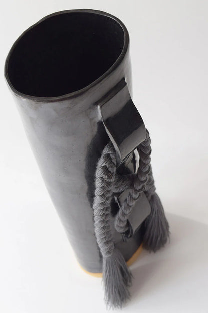 Black Karen Tinney Criss Cross Vase by Ozmun Home, featuring a stylish ceramic design with textured criss cross pattern.