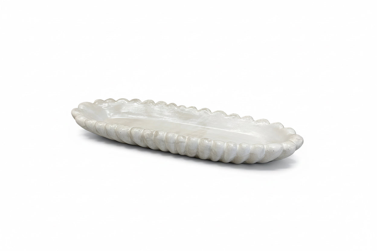 Handmade concrete bowl by Atelier La Rouleuse in antique marble finish, showcasing its textured surface and elegant design.