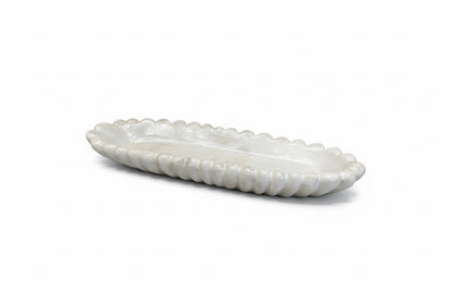 Handmade concrete bowl by Atelier La Rouleuse in antique marble finish, showcasing its textured surface and elegant design.