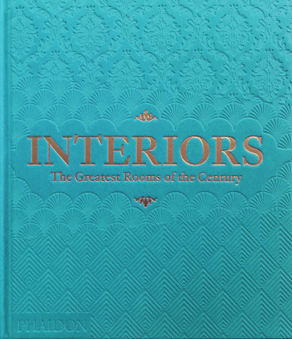 Sky blue cover of Phaidon’s Interiors: The Greatest Rooms of the Century book showing modern interior room designs.