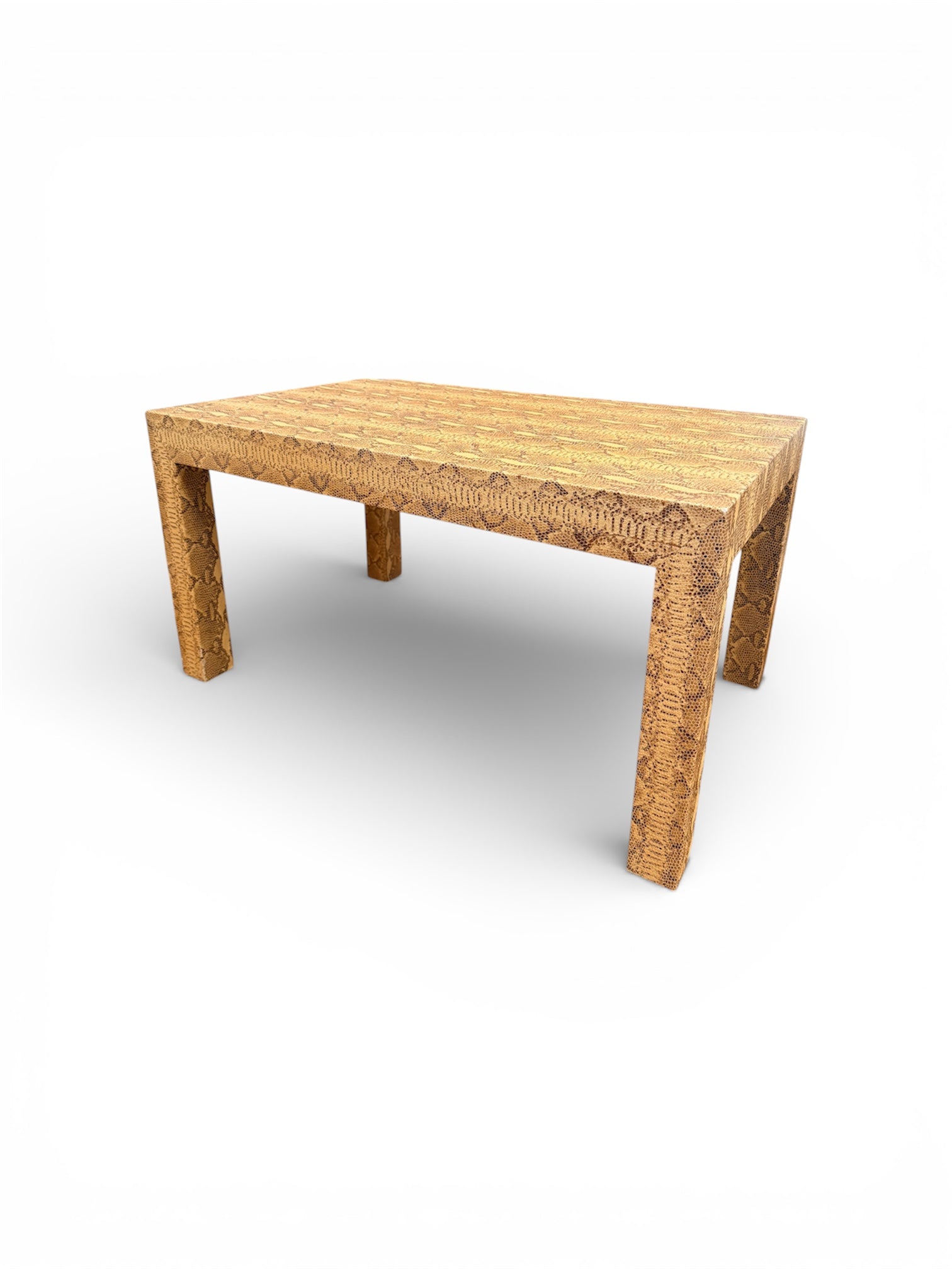 Vintage custom snakeskin coffee table by The Vault Creative with a sleek, textured snakeskin surface and modern design.