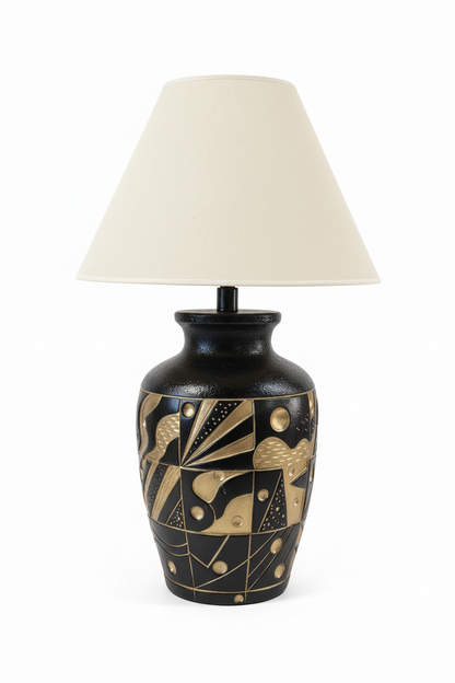 Vintage ceramic mod lamp by The Vault Creative with a sleek, retro design and textured ceramic base in earthy tones.