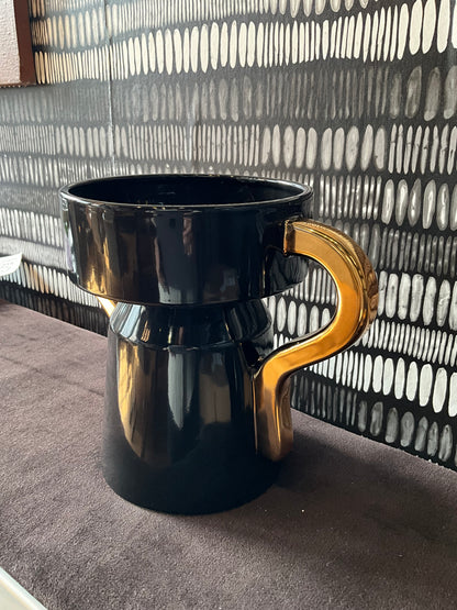 French black and gold ceramic vase by The Vault Creative featuring elegant design and glossy finish.