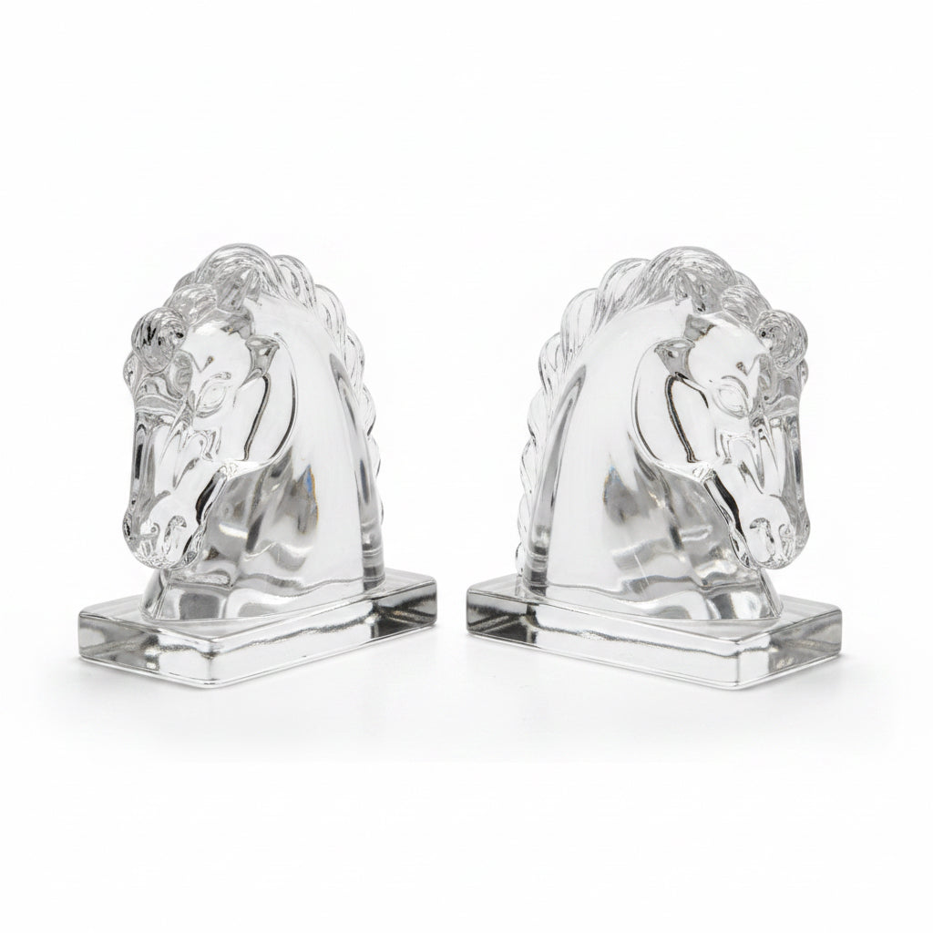 Elegant glass horse bookends by The Vault Creative, featuring clear, detailed horse figures perfect for book display and decor.
