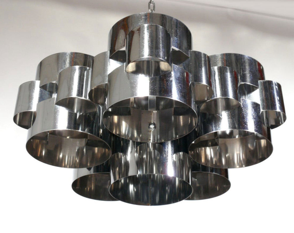 Chrome Cloud Chandelier by Ozmun Home featuring a modern, cloud-inspired design with sleek chrome finish and multiple hanging elements.