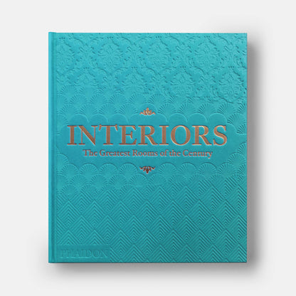 Sky blue cover of Phaidon’s Interiors: The Greatest Rooms of the Century book showing modern interior design and architecture.