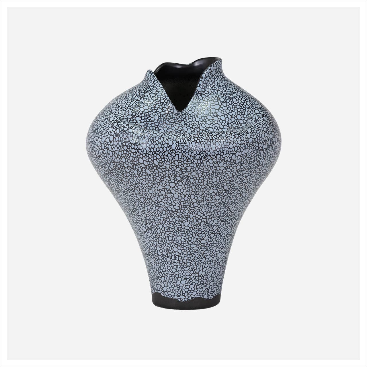Tall Callum vase by Kavana Decor, featuring a sleek, modern design with a textured surface in neutral tones.