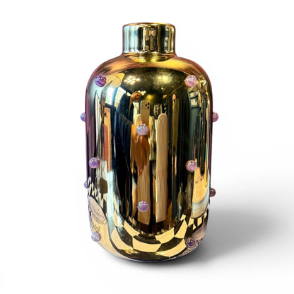 P. Grunsfeld Gold Amethyst Vase by The Vault Creative featuring a gold-toned and amethyst-colored glass design with a sleek shape.