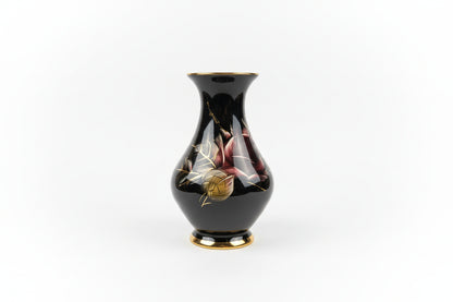 Vintage flower vase by The Vault Creative featuring a classic design and floral accents, perfect for decorative floral arrangements.