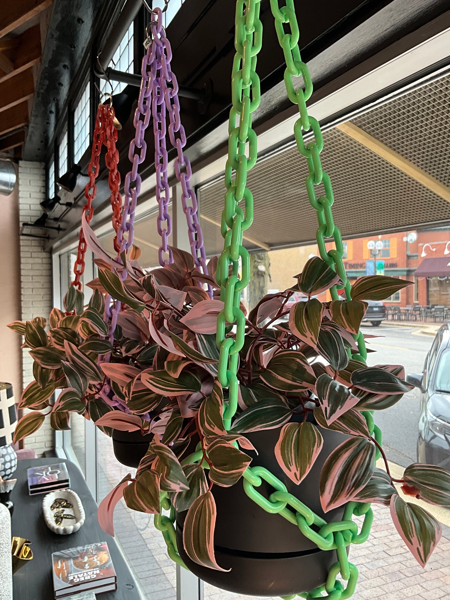 Purple Mod Hanging Planter by The Vault Creative featuring a modern design with a round shape and hanging chain for indoor decor.