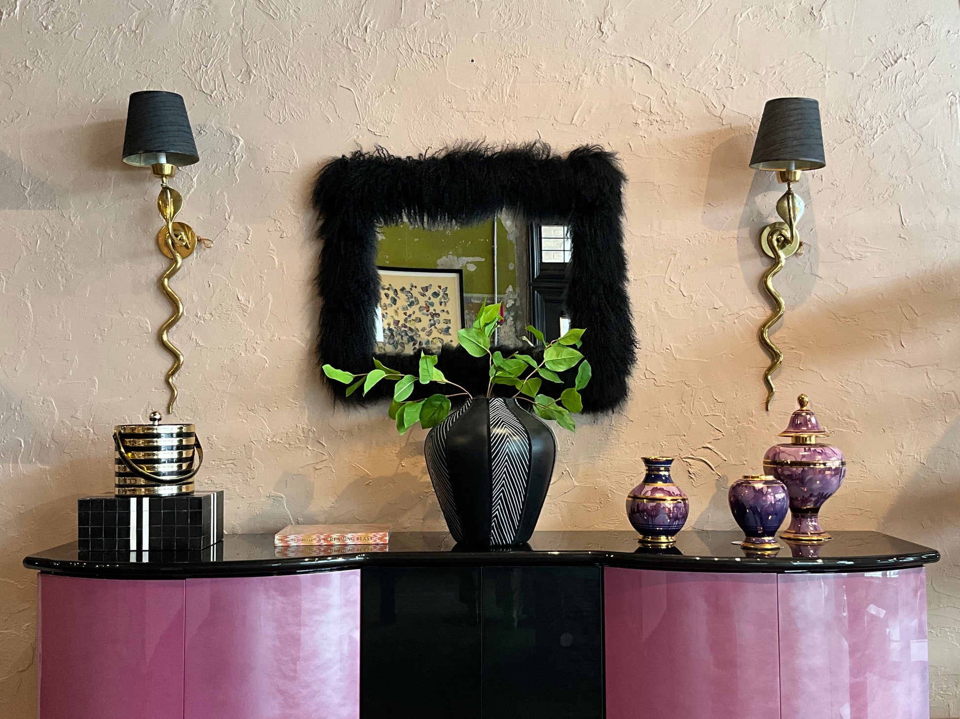 Pair of vintage brass snake sconces with intricate detailing, designed for wall mounting and decorative lighting.