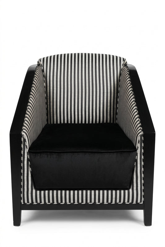 Deco chair by The Vault Creative with sleek metal frame and upholstered seat in modern design.