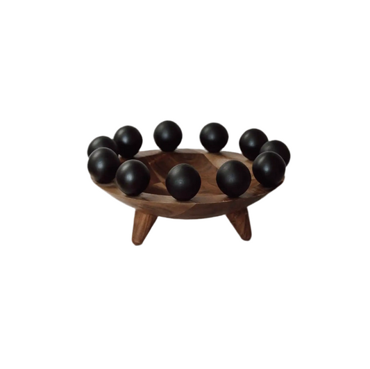 Black and walnut Ball Boy figurine by The Vault Creative, showcasing a detailed, modern sculpture with a sleek finish.