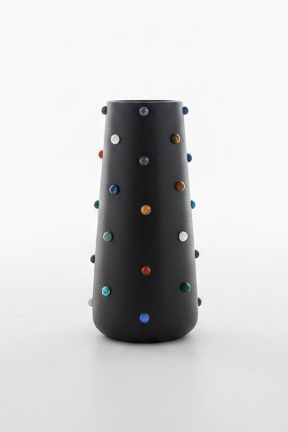 The Vault Creative P. Grunsfeld 8-inch multi-stone vase with a textured finish, showcasing a modern, handcrafted ceramic design.