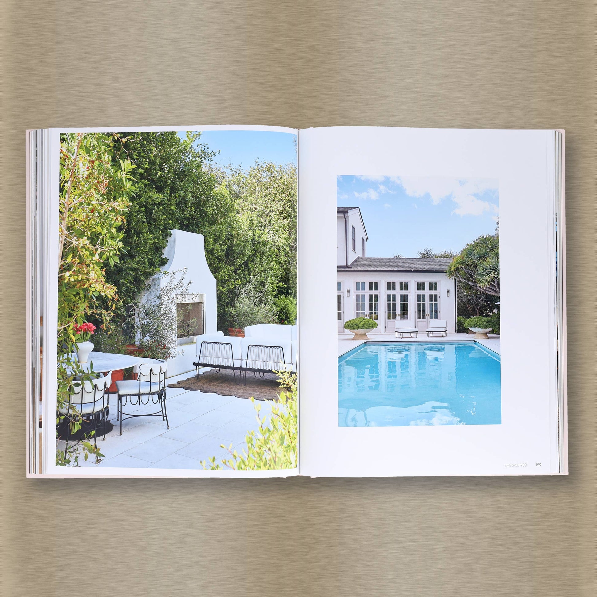 Livable Luxe book by Chronicle Books showing a stylish interior design with modern furniture and decor.