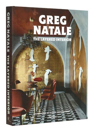 Open interior view of "The Layered Interior" book by Penguin Random House LLC showing layered pages and design elements.