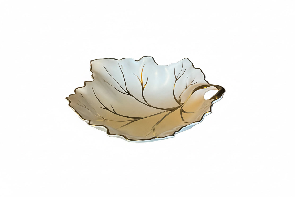 Vintage Limoges porcelain leaf dish with intricate floral details, handcrafted by The Vault Creative.