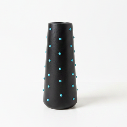 P. Grunsfeld Studded 10-inch ceramic vase by The Vault Creative with a textured, studded design and a glossy finish.