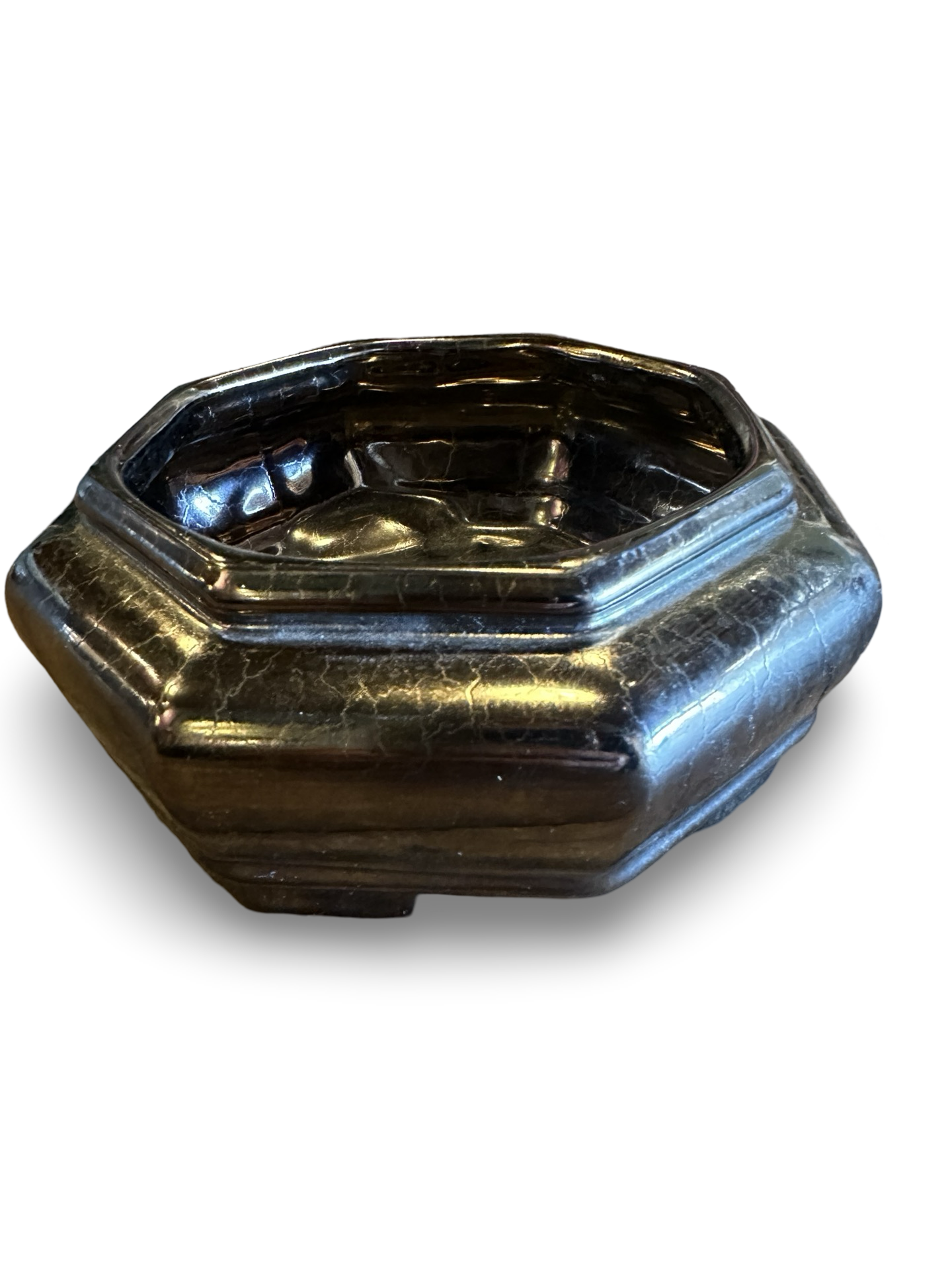 Ozmun Home metal vase bowl with a sleek, modern design, featuring a rounded shape and metallic finish for decorative use.