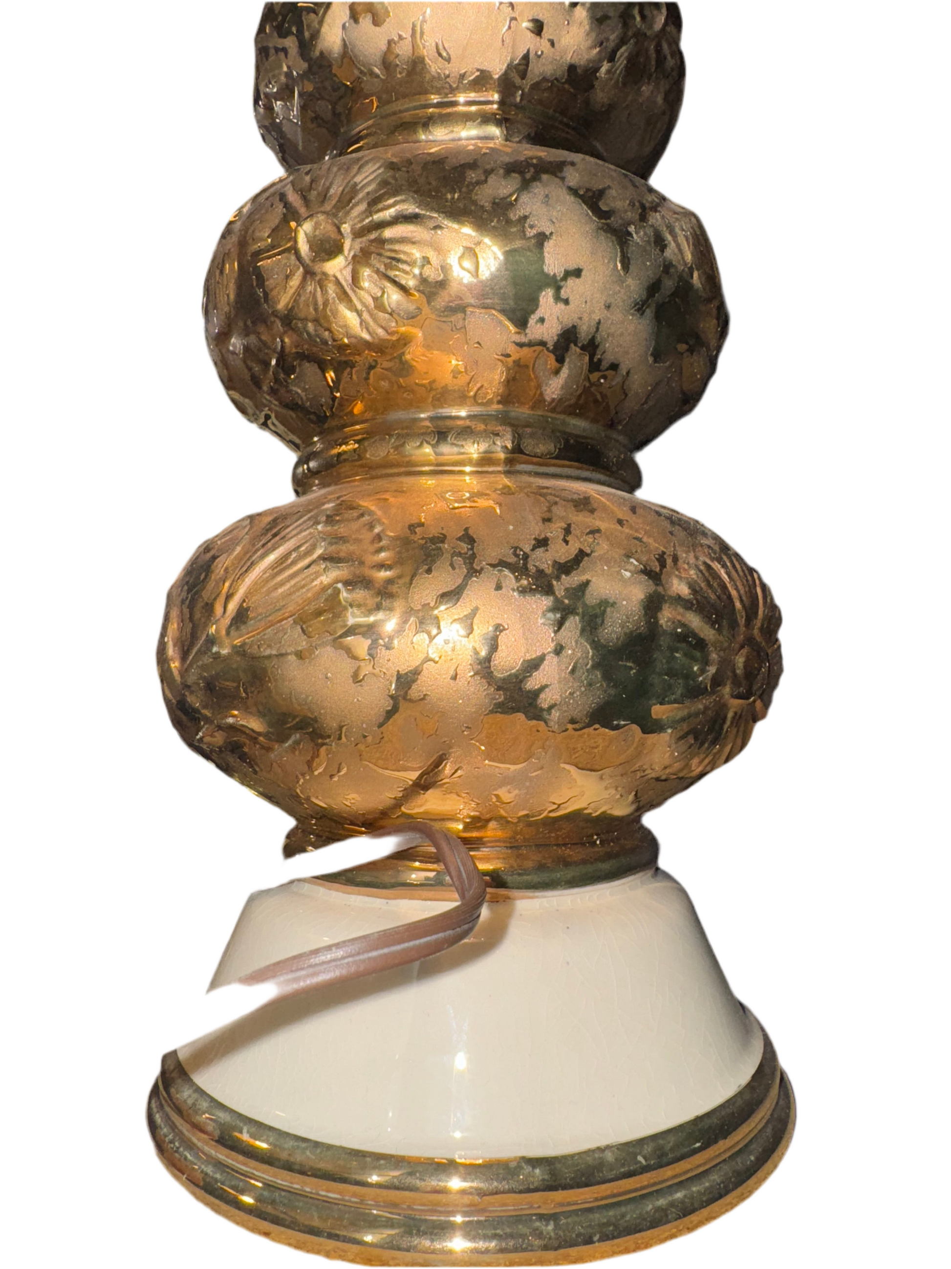 Pair of gold gilt lamps by Ozmun Home with ornate bases and fabric shades, ideal for elegant living room or bedside lighting.