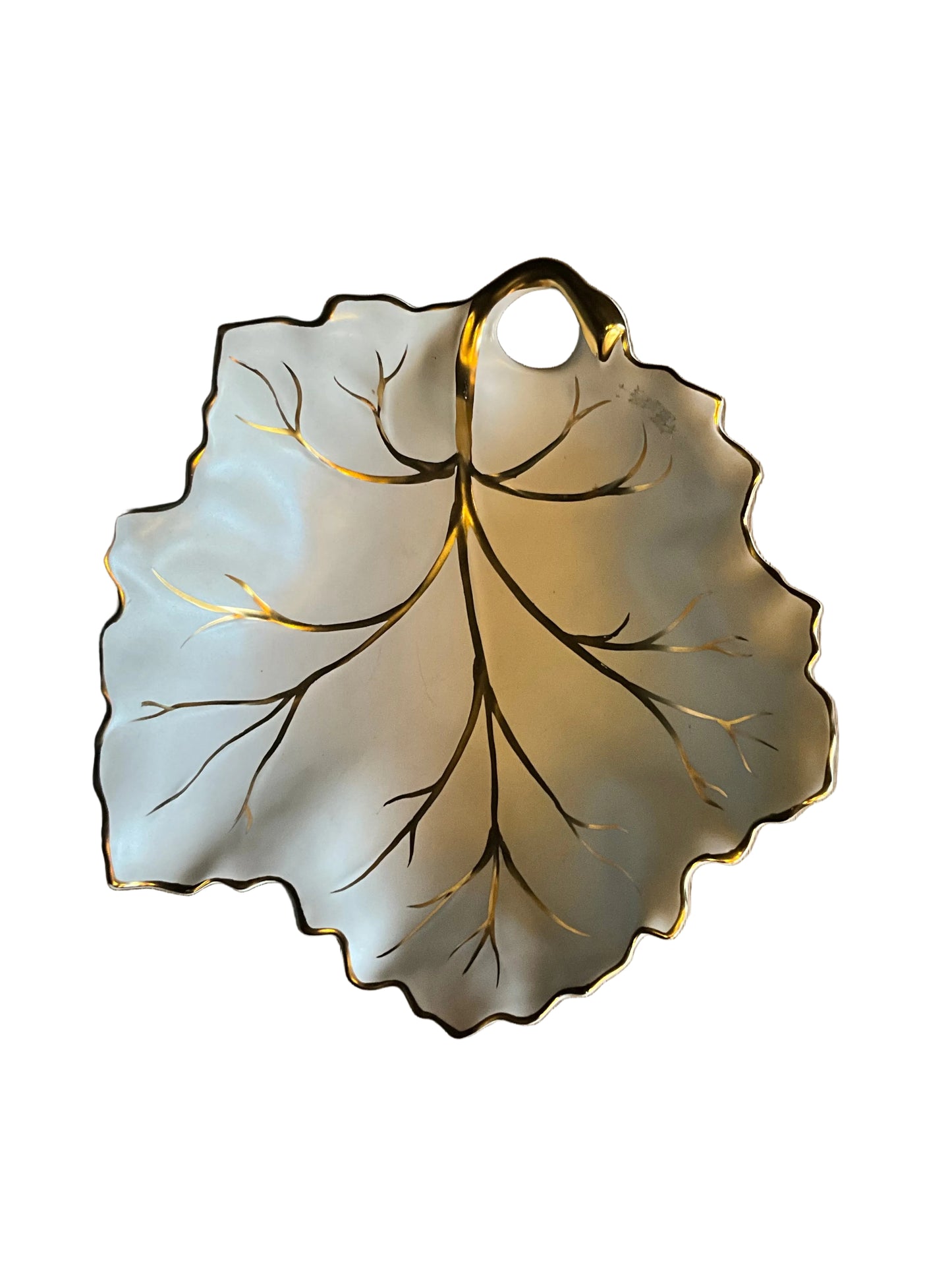 Vintage Limoges porcelain leaf dish with intricate floral design, crafted by The Vault Creative, showcasing delicate craftsmanship.