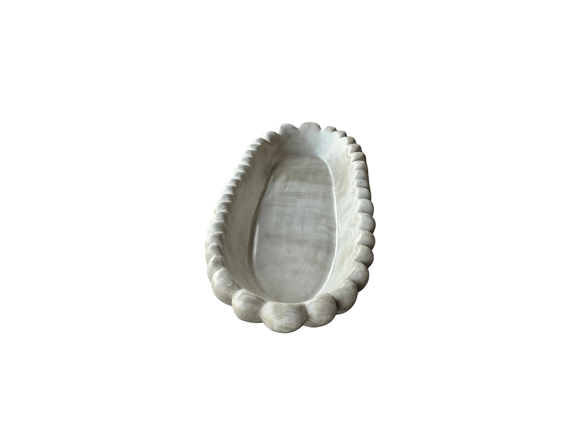 Handmade concrete bowl with antique marble finish by Atelier La Rouleuse, showcasing a large, stylish, textured interior design.